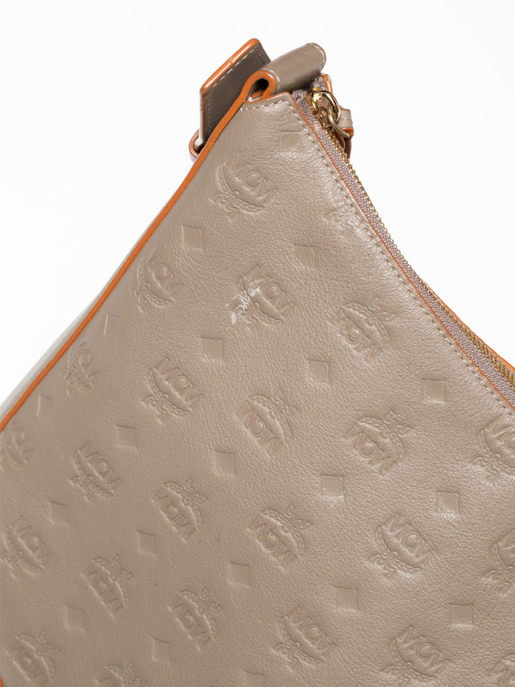 Mcm klara monogram best sale calfskin leather crossbody pouch