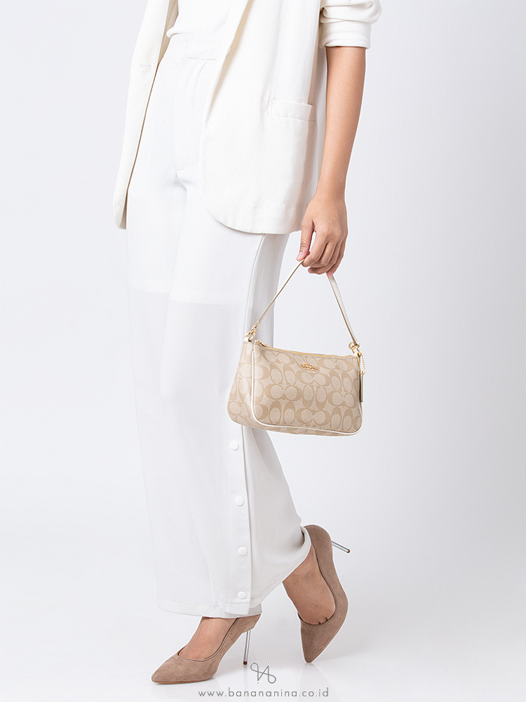 coach top handle pouch