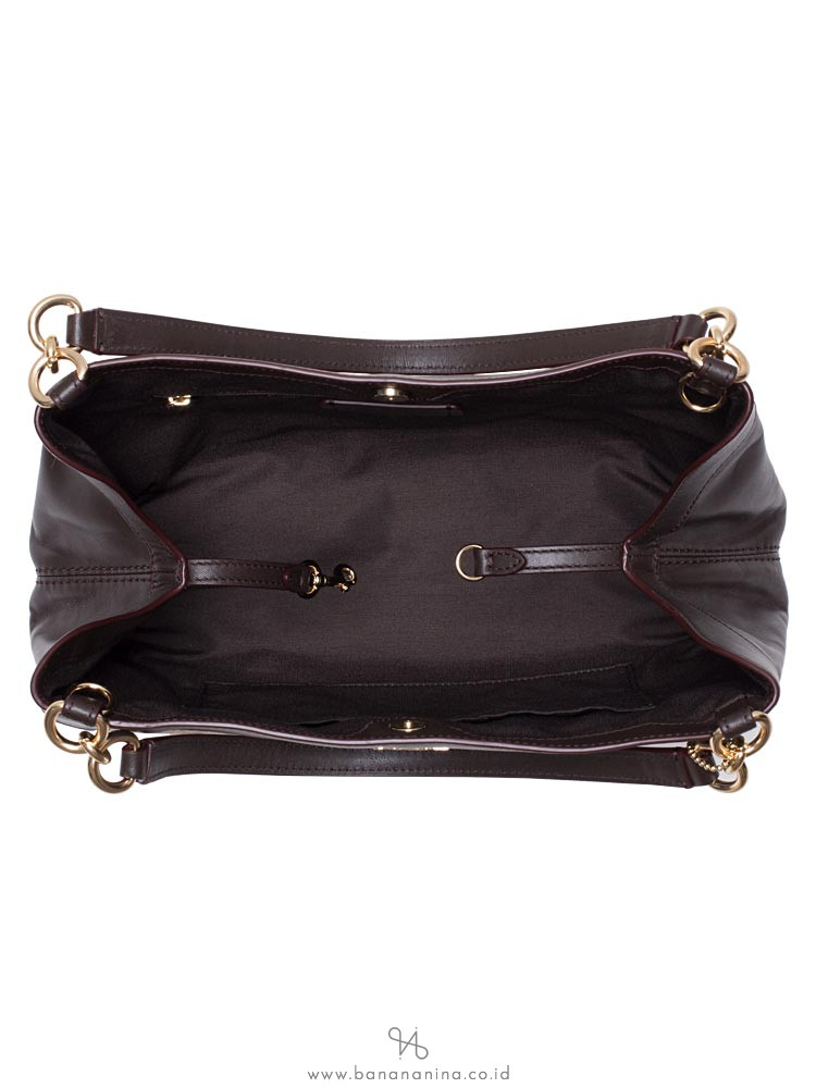 coach signature outline small lexy