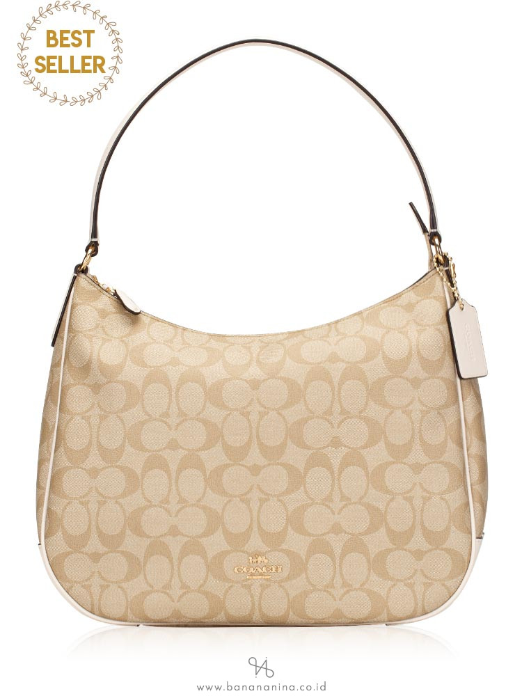 zip shoulder bag in signature canvas