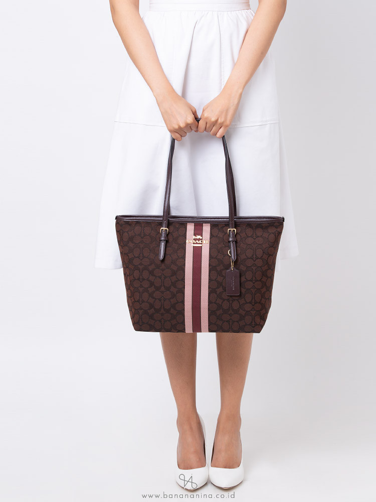 zip top tote in signature jacquard