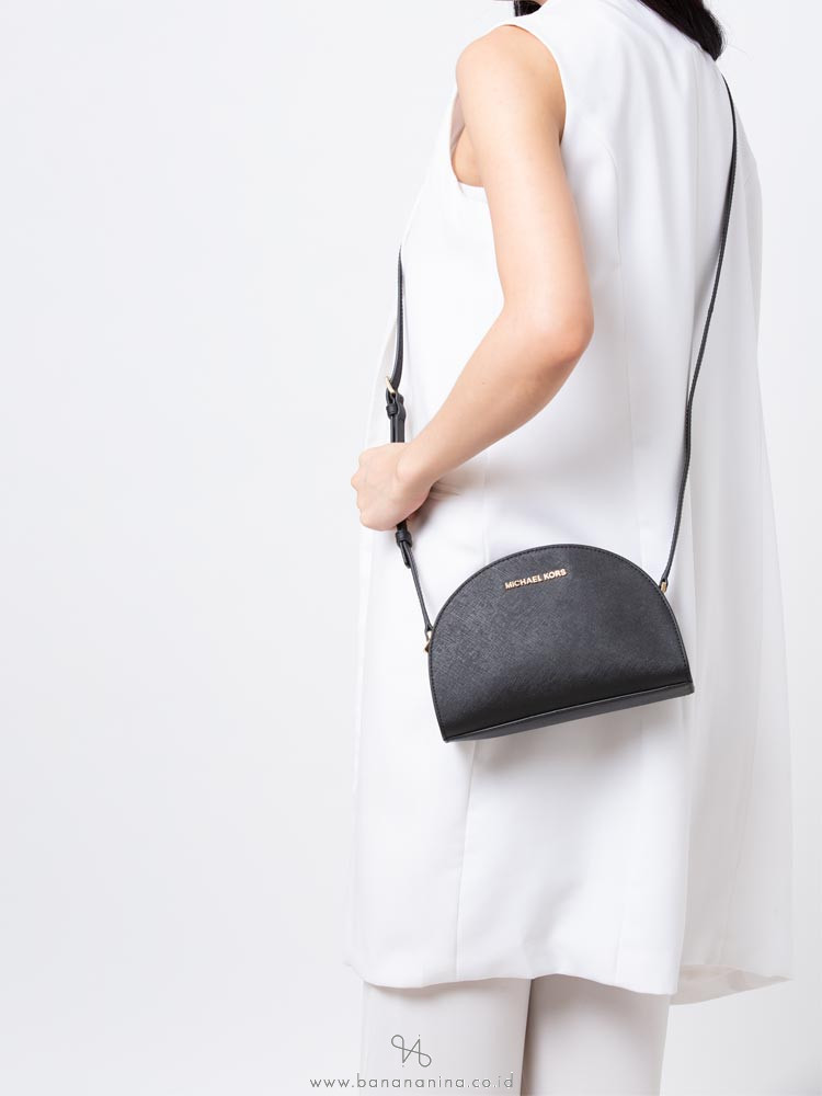 michael kors half moon crossbody