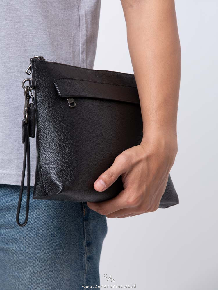 coach clutch men Cinosural International School