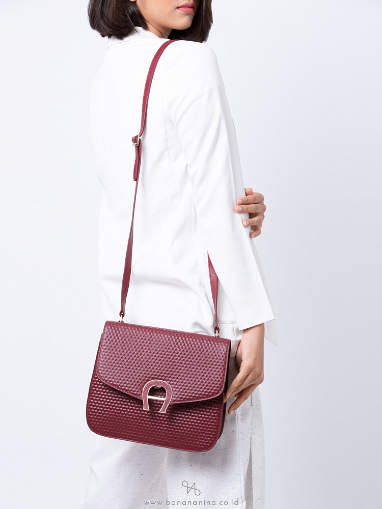AIGNER Pina Genoveva Leather Crossbody Garnet