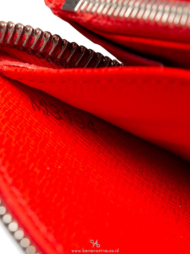 LOUIS VUITTON Epi Zippy Wallet Coquelicot
