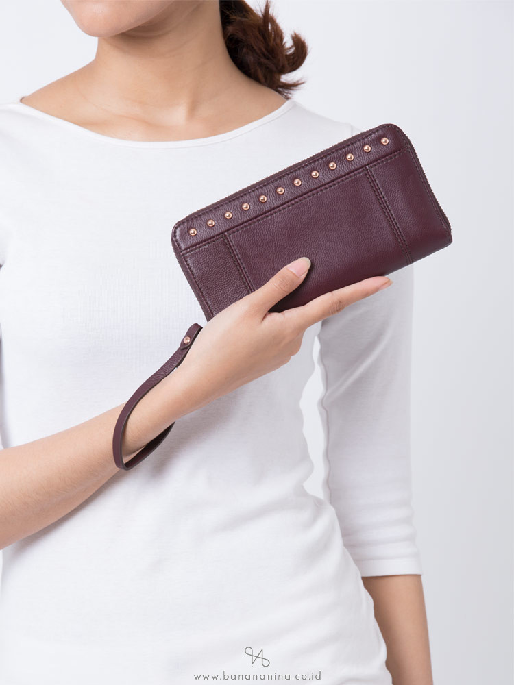 jori zip clutch fossil