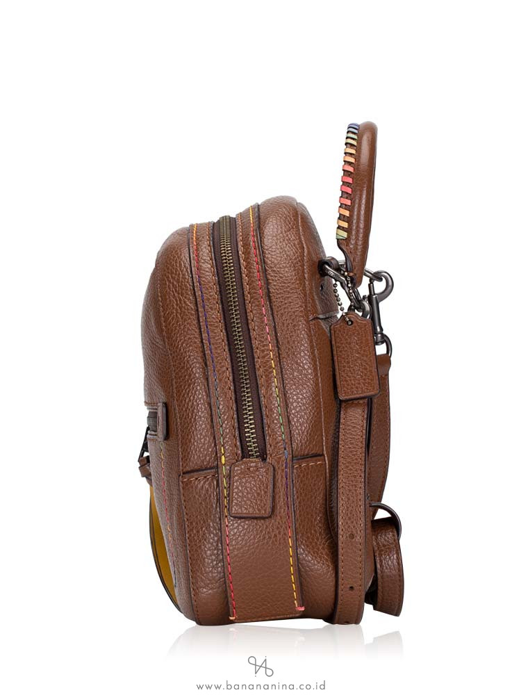 coach andi backpack with rainbow stitching