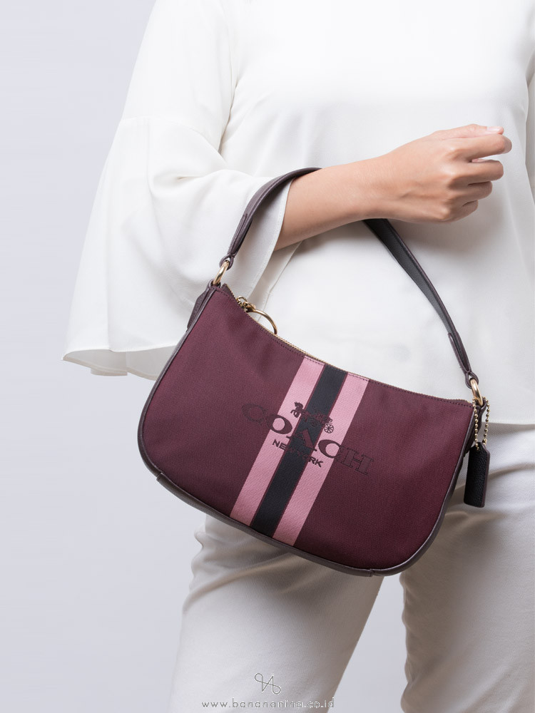 COACH 69647 Horse and Carriage Sutton Crossbody Oxblood