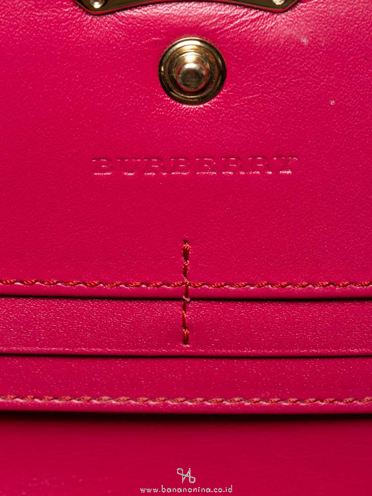 BURBERRY Embossed Check Grain Porter Continental Wallet Fuschia
