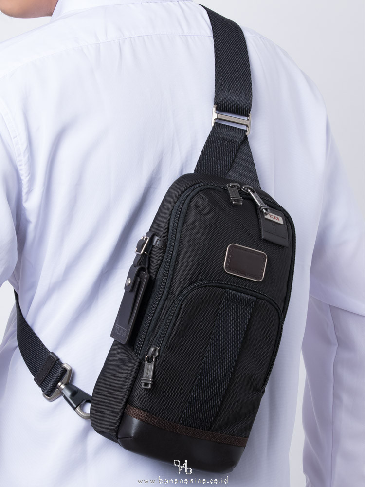 tumi sling backpacks