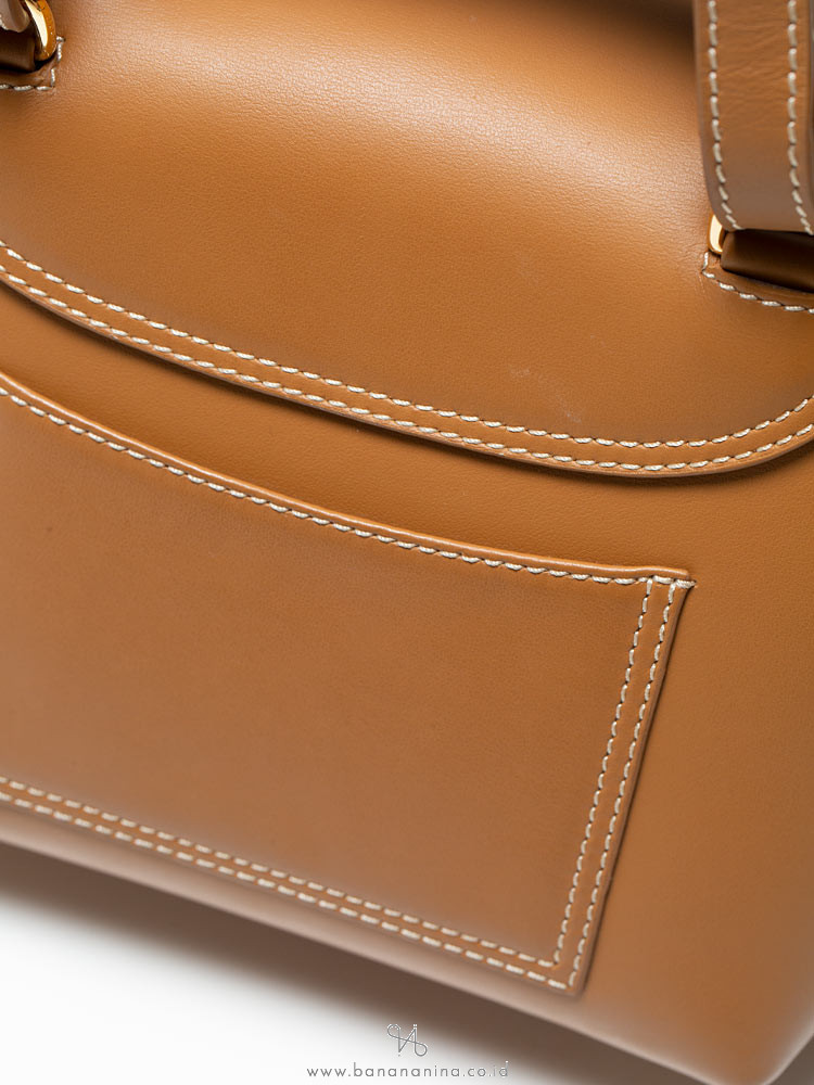 Polène Numero Uno Nano in taupe textured leather — Php24,500 Check