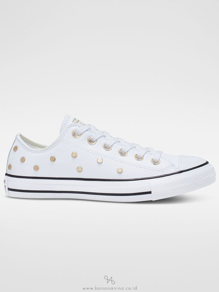 white converse with gold studs