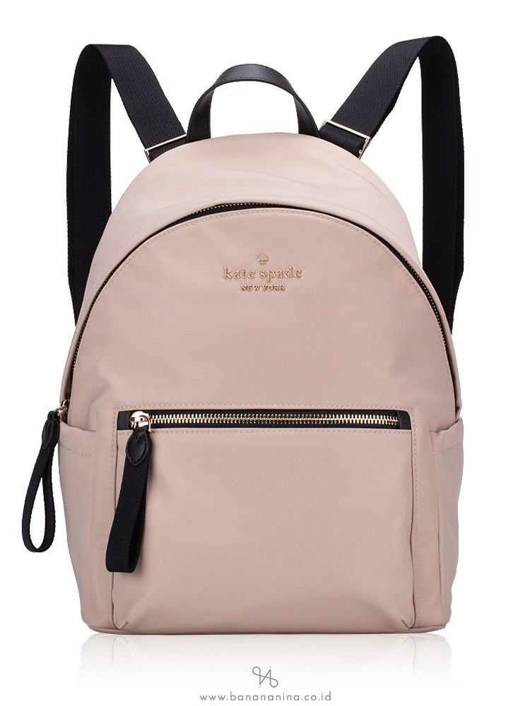Kate spade backpack with side outlet pockets